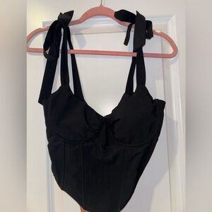 Black crop top with tie strings and corset style, zipper back